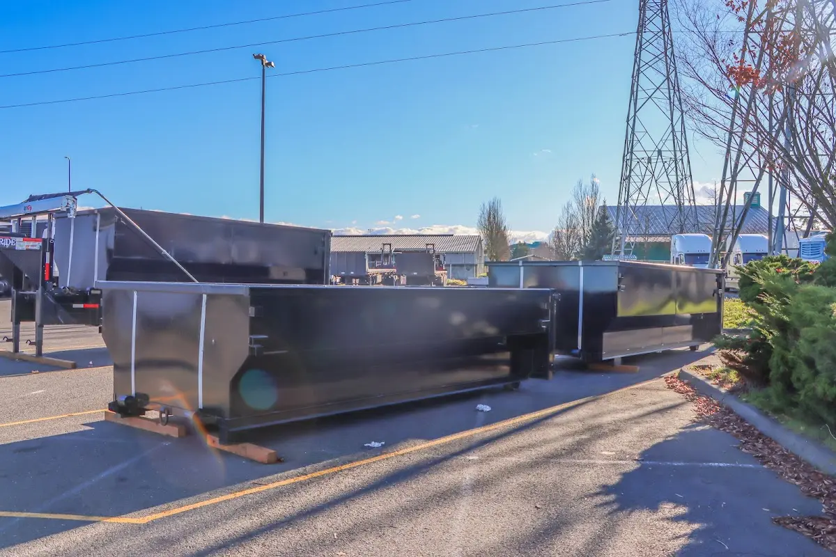 Roll-off dumpster ready for waste disposal at job site for Construction Dumpster Rental in Godfrey
